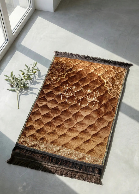 Brown textured jay namaz with black border on a light gray floor.