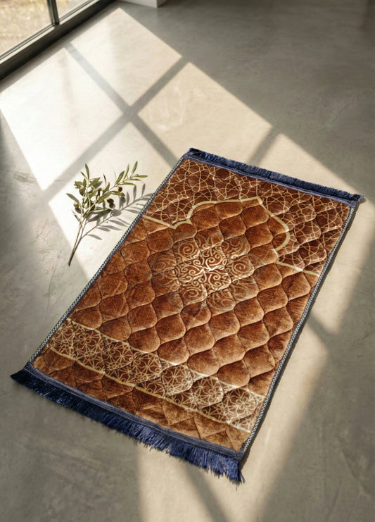 Brown textured soft velvet jay namaz & prayer mat with blue border on a gray floor