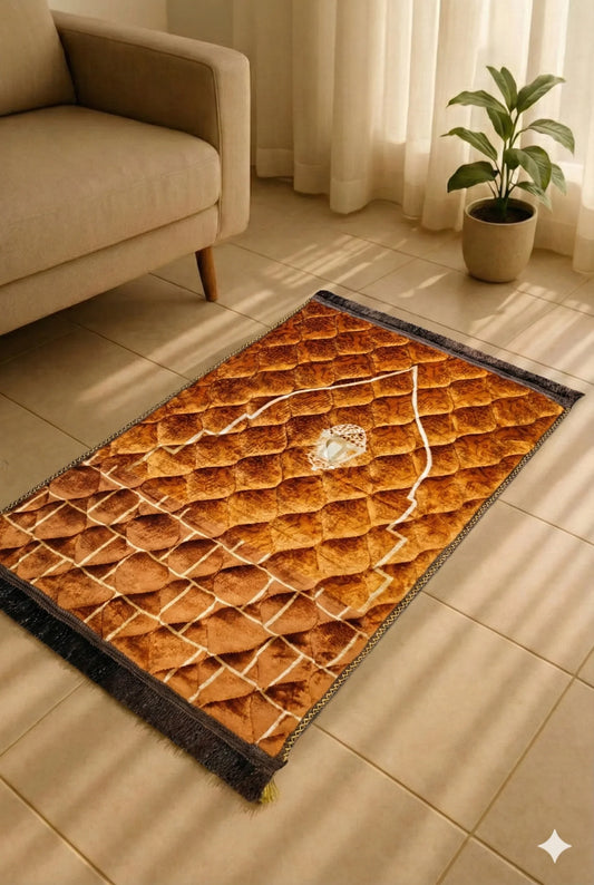 Brown Islamic prayer mat with intricate patterns placed on tiled floor near beige sofa and potted plant